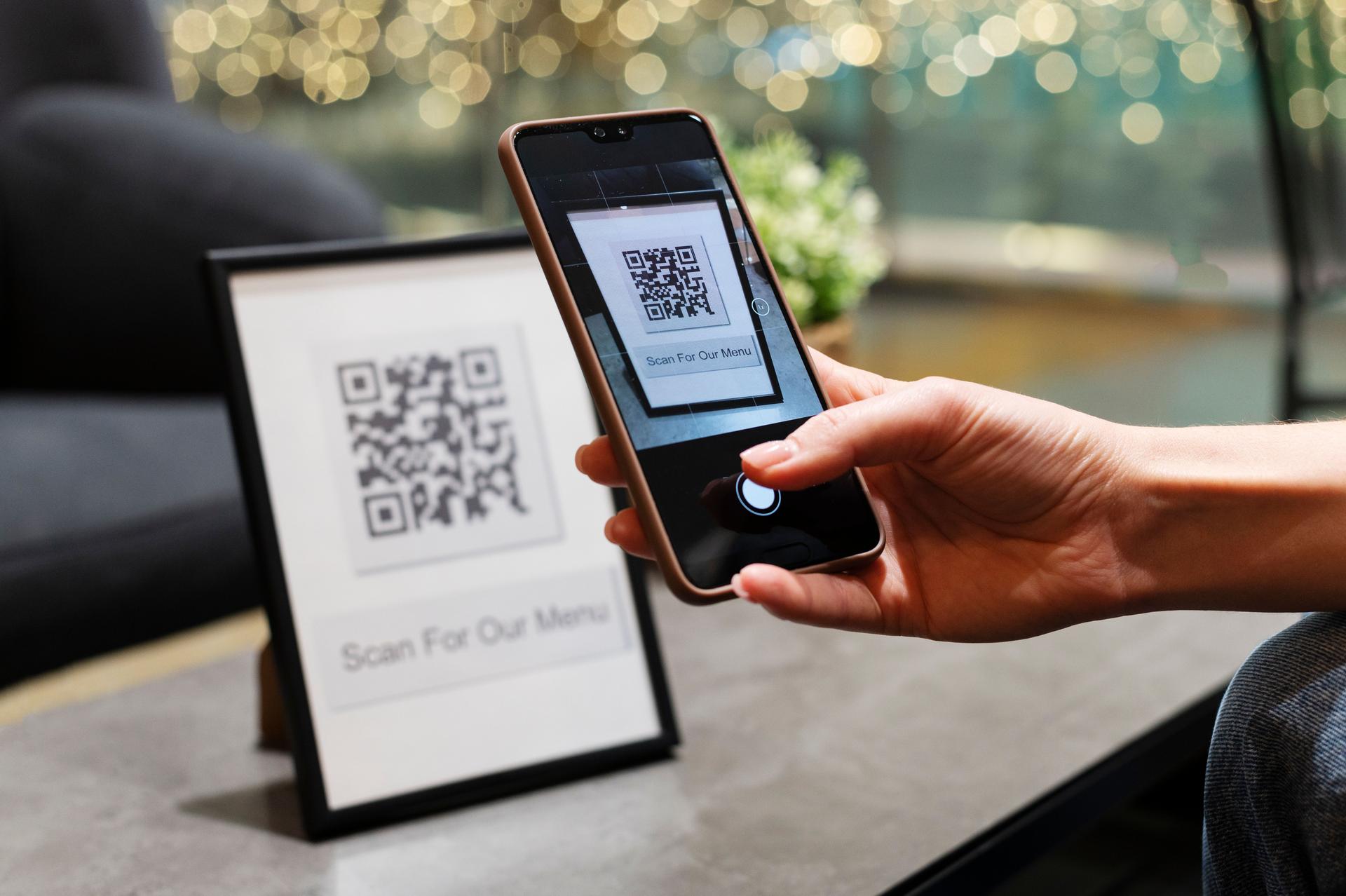 person-scanning-qr-code